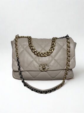 CHANEL Beige Quilted Lambskin Chanel 19 Large Flap Shoulder Bag
c. 2019–Present.